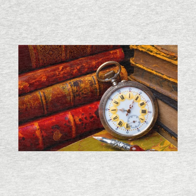 Beautiful Old Pocket Watch And Stacked Books by photogarry